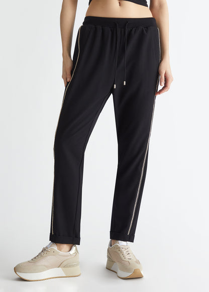 Blue trousers with chain detailing - Dantoni Shop