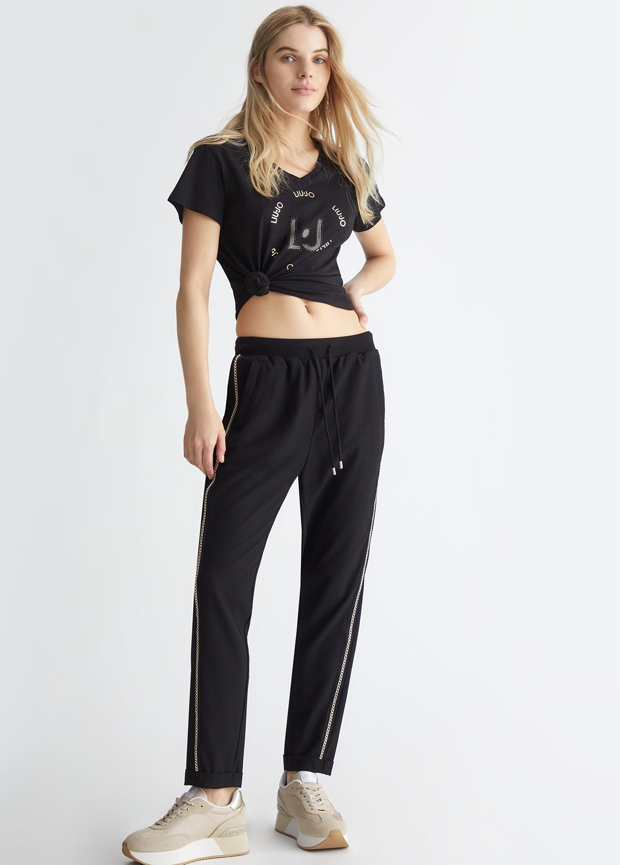 Blue trousers with chain detailing - Dantoni Shop